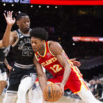 Young, Hunter pace Hawks past reeling Spurs 125-106