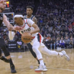 Fox, Sabonis help Kings rout short-handed Blazers 113-116