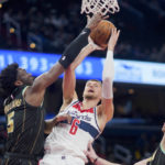 Porzingis makes eight 3s as Wizards beat Hornets, end skid
