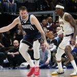 Davis leads rally from 27 down as Lakers beat Mavs 111-108