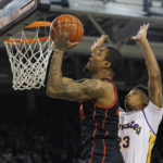 No. 1 Houston tops East Carolina to claim outright AAC title