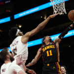 Hawks pull away in 1st half, rout Cavaliers 136-119