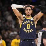 James closes in on scoring record, Lakers rally past Pacers