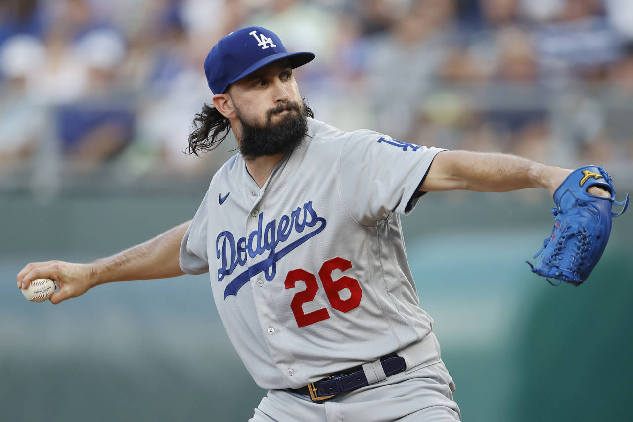 FILE -Los Angeles Dodgers pitcher Tony Gonsolin throws to a Kansas City Royals batter during the fi...