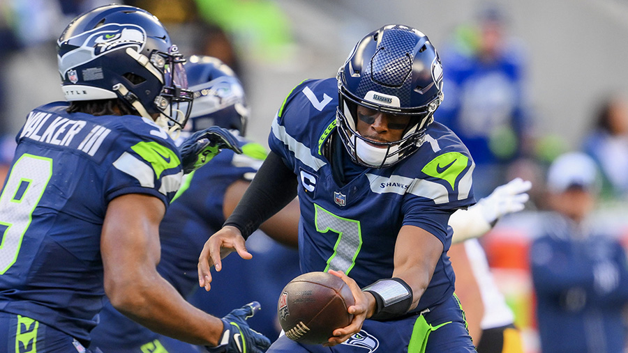 Seattle Seahawks offense Geno Smith Kenneth Walker III...